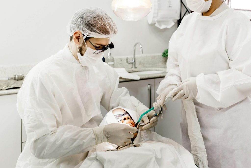 A dentist and assistant working together in a clinic